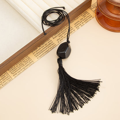 Black Irregular Resin and Polyster Tassel Necklace, elegant gift for her, side view