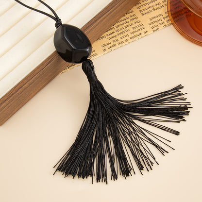 Black Irregular Resin and Polyster Tassel Necklace, elegant gift for her, detail close-up