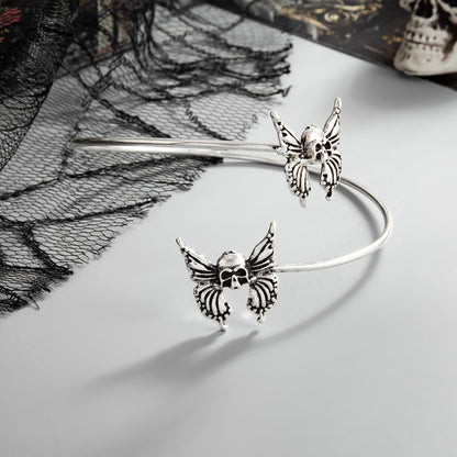 Silvertone Dual-Skull-Butterflies Bypass Arm Cuff, everyday style, side view