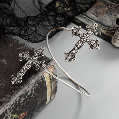 Silvertone Dual-Floral-Cross Bypass Arm Cuff, botanical inspired, detail close-up