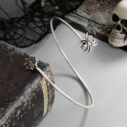 Silvertone Spider and Web Bypass Arm Cuff, dainty minimalist design, detail close-up