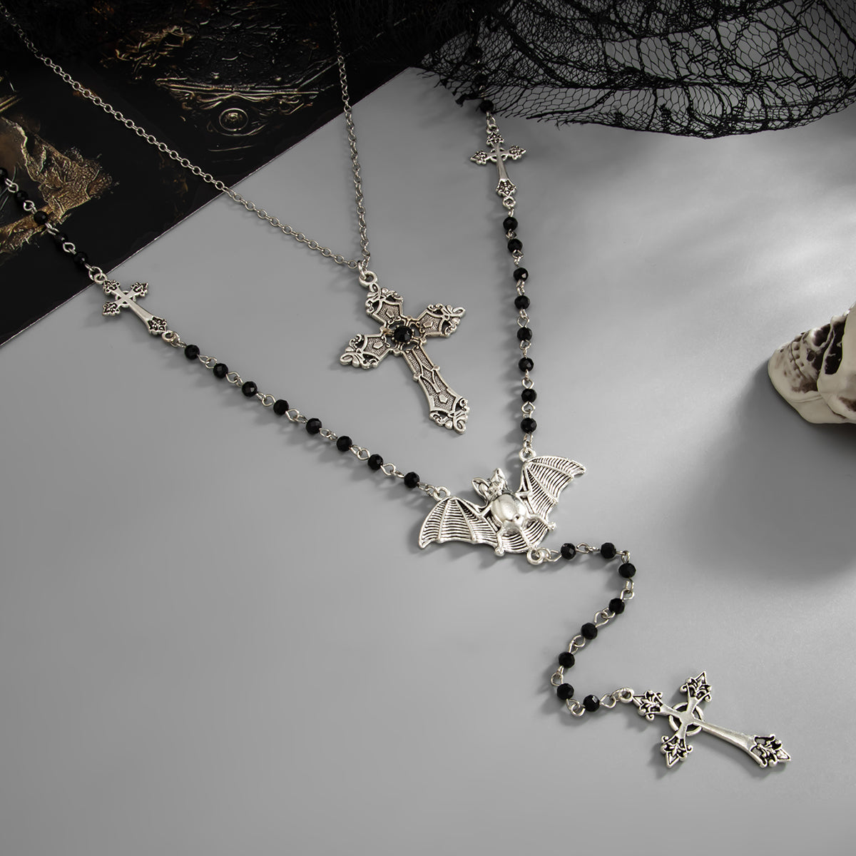 Black Acrylic and Silvertone Bat Cross Drop Necklace Set, silver pendant necklace for women, detail close-up
