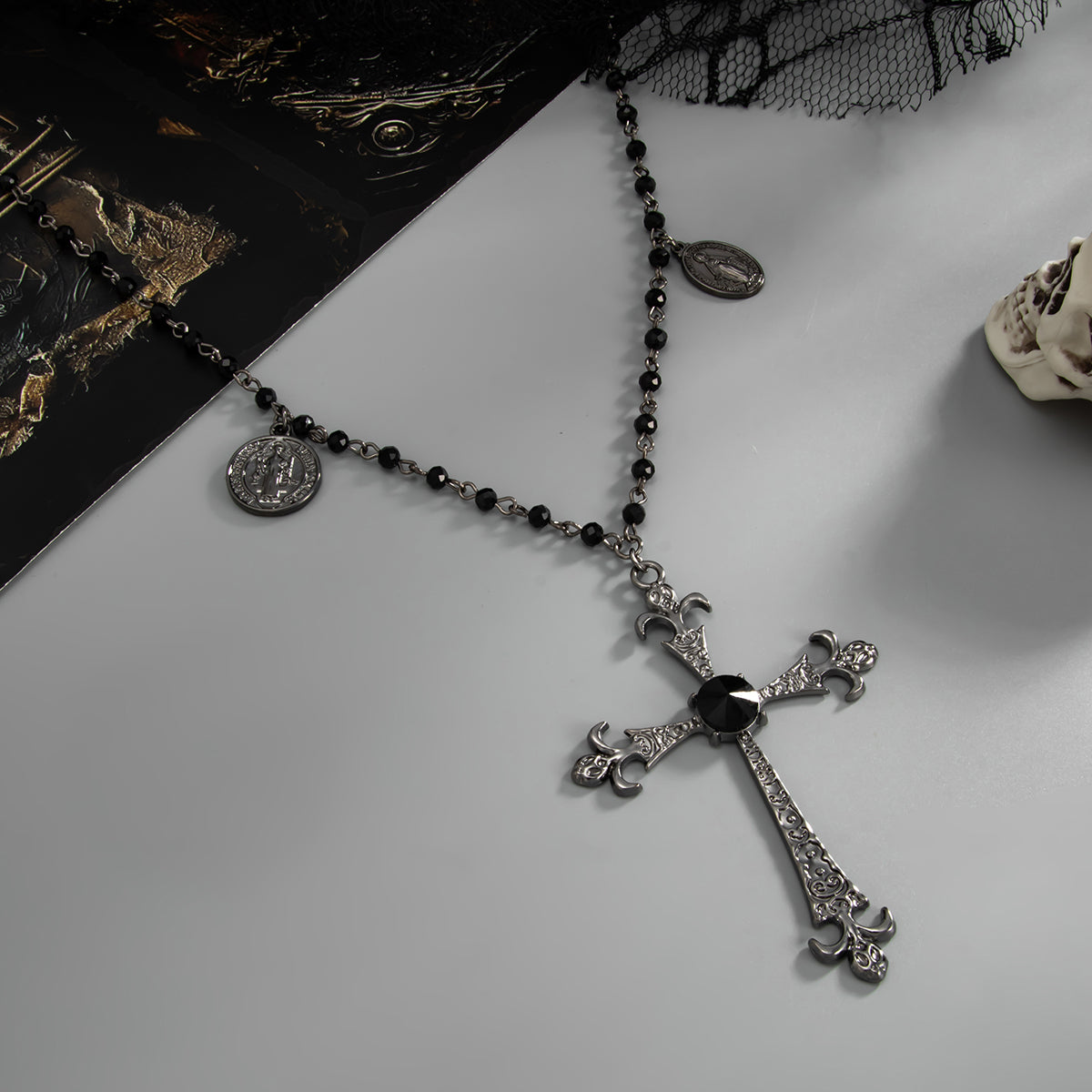 Black Cubic Zirconia and Acrylic Blacktone Coin Cross Pendant Necklace, dainty minimalist design, side view