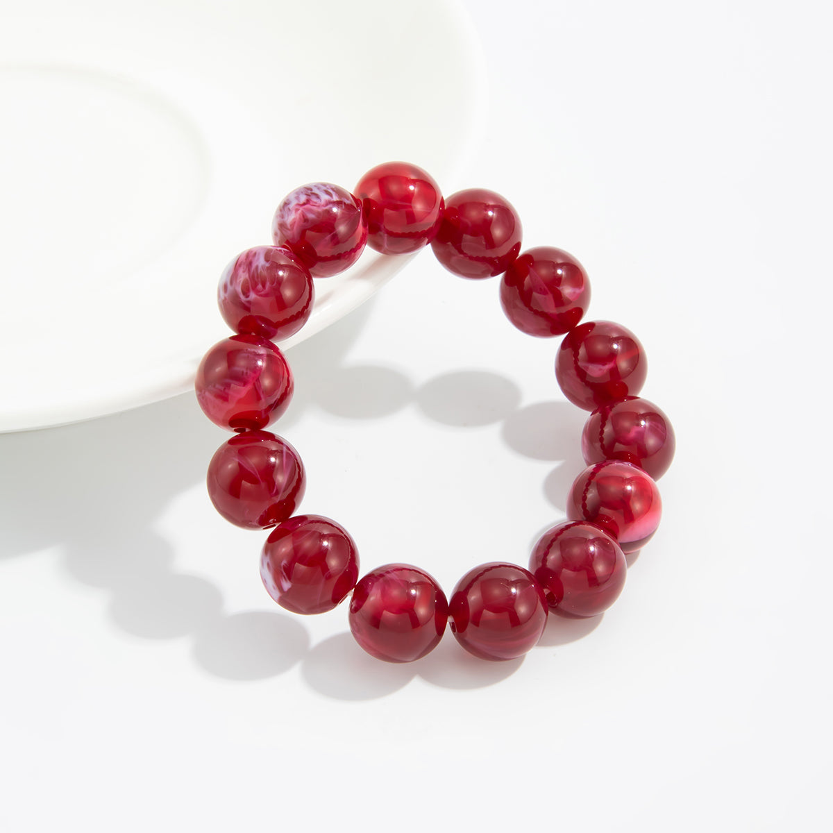 Wine Red Resin Beaded Stretch Bracelet, botanical inspired, side view