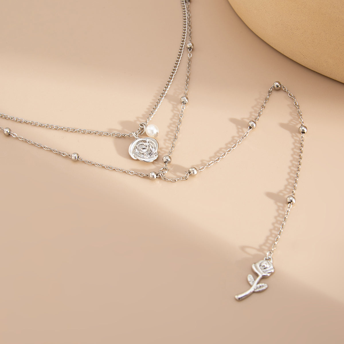 Pearl and Silvertone Rose Drop Layered Necklace, vintage-inspired design, detail close-up