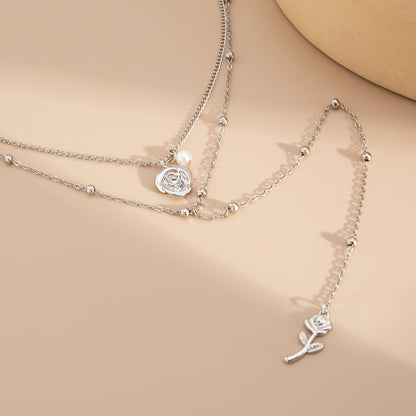 Pearl and Silvertone Rose Drop Layered Necklace, vintage-inspired design, detail close-up