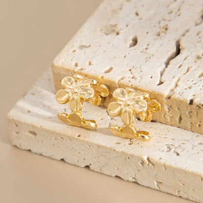 Goldtone Flower Ear Cuffs, vintage-inspired design, detail close-up