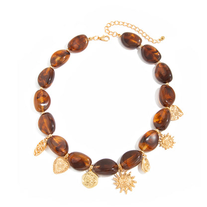 Irregular Resin and Goldtone Beaded Heart Sun Pendant Necklace, everyday style, front view