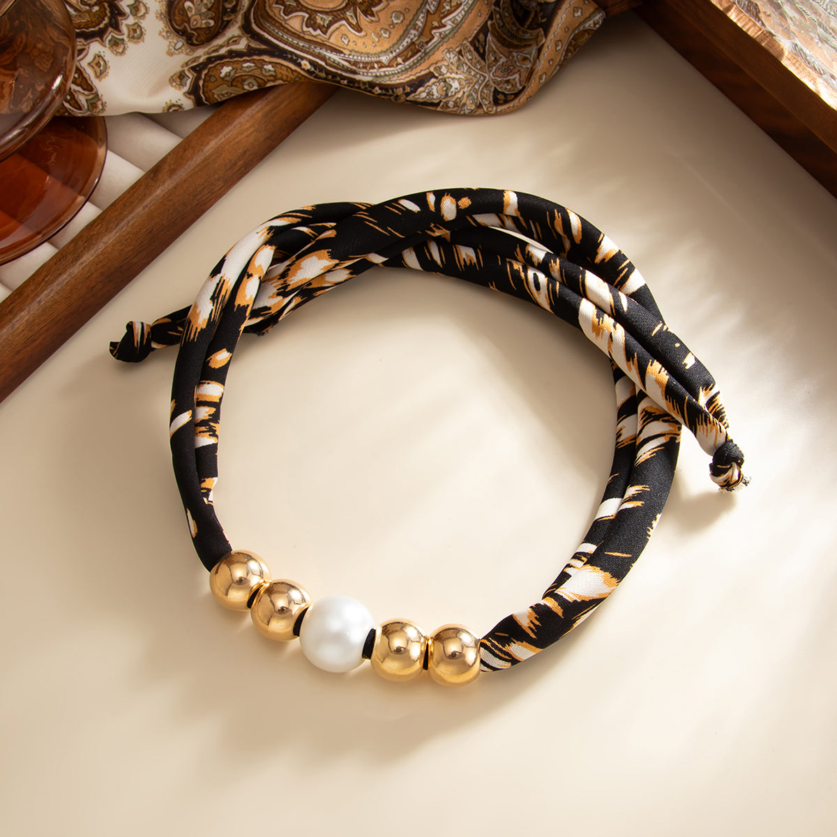 Botany Print Polyster and Pearl Goldtone Ball Collar Necklace, botanical inspired, side view