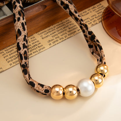 Leopard Print Polyster and Pearl Goldtone Ball Collar Necklace, dainty minimalist design, detail close-up