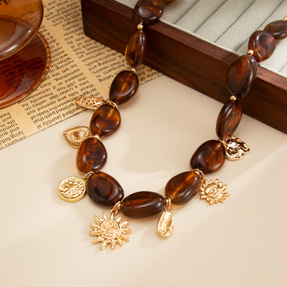 Irregular Resin and Goldtone Beaded Heart Sun Pendant Necklace, everyday style, side view