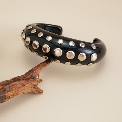 Black Resin and Silvertone Layered Spot Cuff, silver bracelet for women, vintage-inspired design, side view