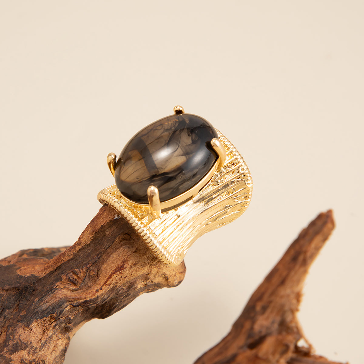 Gray Resin and Goldtone Prong-Set Oval Open Ring, botanical inspired, detail close-up