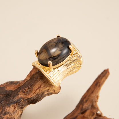 Gray Resin and Goldtone Prong-Set Oval Open Ring, botanical inspired, detail close-up