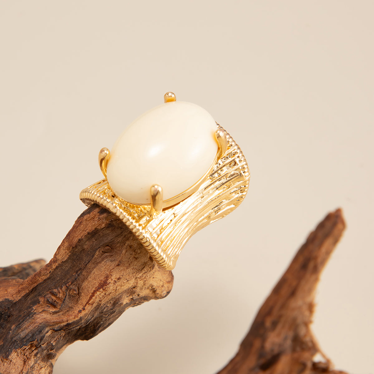 Beige Resin and Goldtone Prong-Set Oval Open Ring, botanical inspired, side view