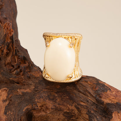Beige Resin and Goldtone Prong-Set Oval Open Ring, botanical inspired, detail close-up