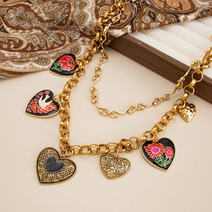 Black Enamel and Goldtone Flower Heart Charm Collar Necklace, vintage-inspired design, detail close-up
