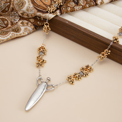 Two Tone Bead Cluster Station Olecranon Pendant Necklace, everyday style, side view