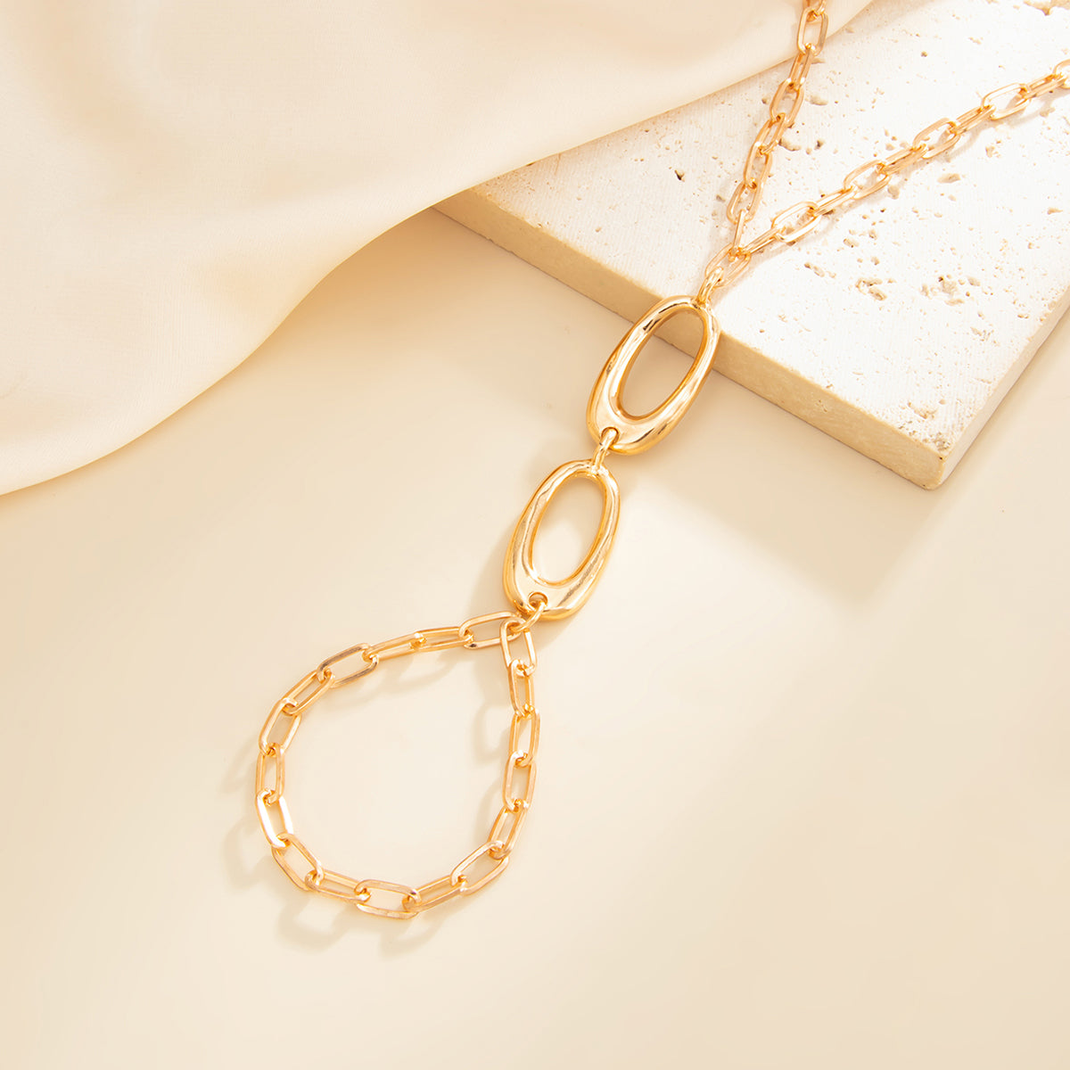 Goldtone Open Oval Finger-to-Wrist Bracelet, gold bracelet for women, elegant gift for her, side view