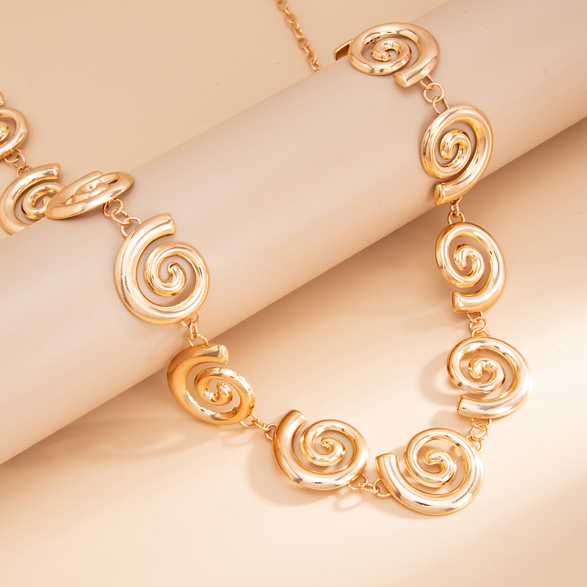 Goldtone Swirl Charm Waist Chain, dainty minimalist design, lifestyle look