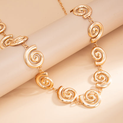 Goldtone Swirl Charm Waist Chain, dainty minimalist design, lifestyle look