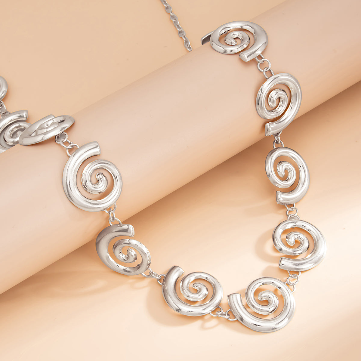 Silvertone Swirl Charm Waist Chain, dainty minimalist design, side view