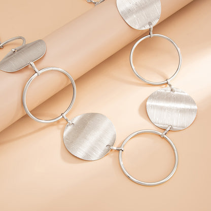 Silvertone Textured and Open Circular Charm Waist Chain, botanical inspired, side view