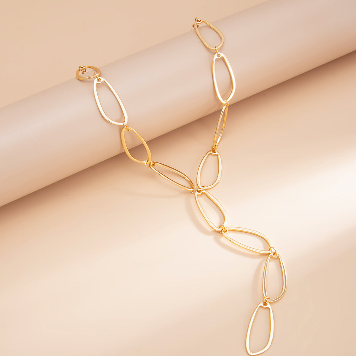 Goldtone Open Drop Lariat Necklace, botanical inspired, side view