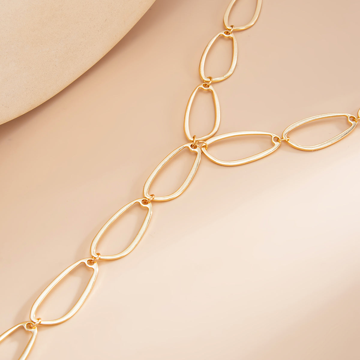 Goldtone Open Drop Lariat Necklace, botanical inspired, detail close-up