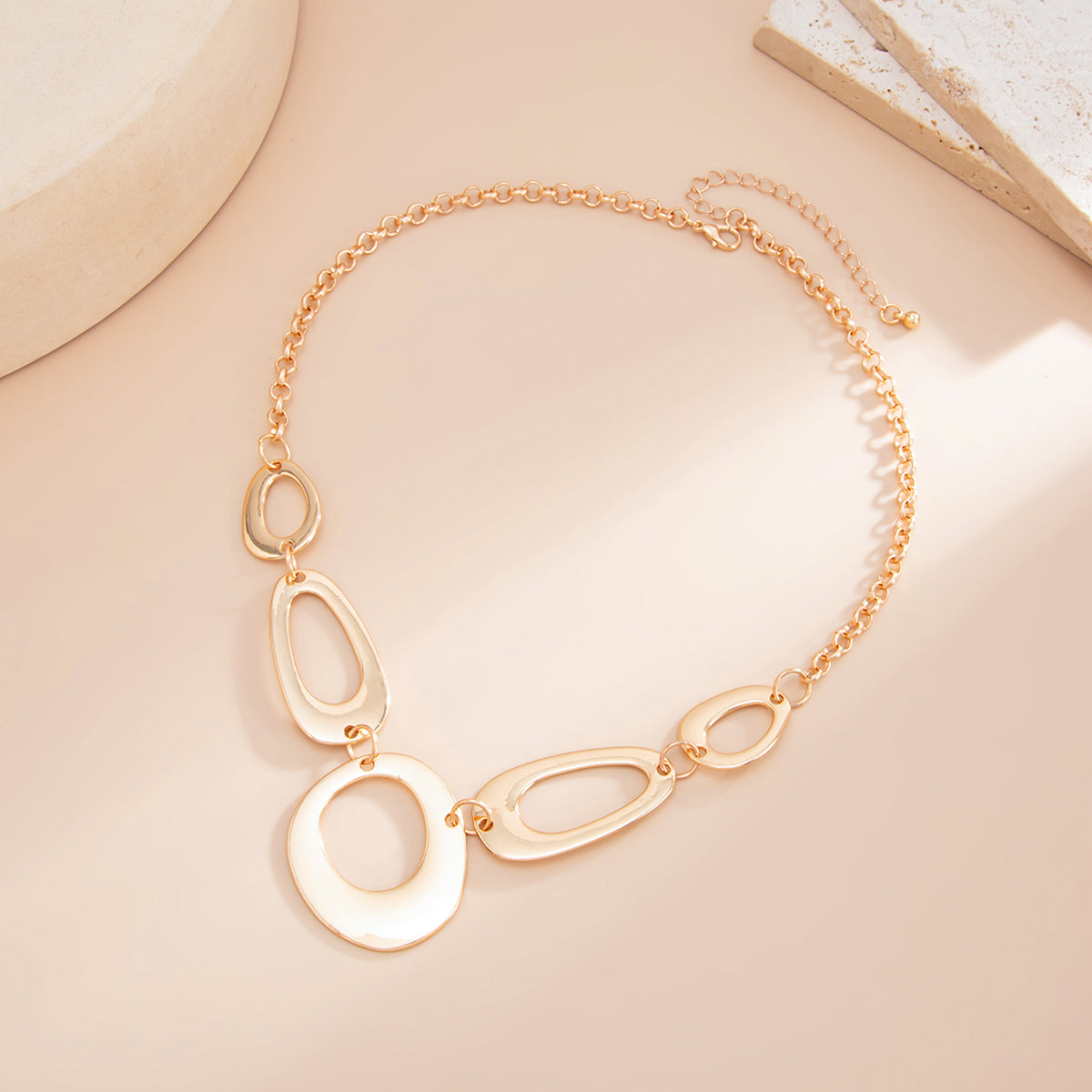 Goldtone Open Geometric Necklace, dainty minimalist design, side view