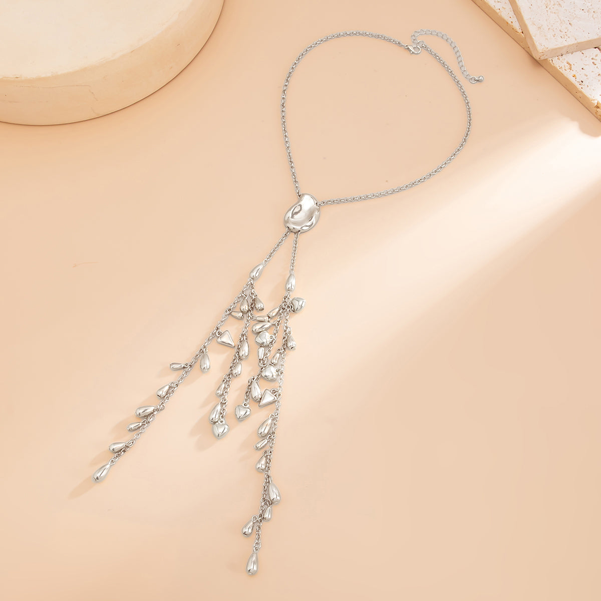 Silvertone Geometric Tassel Statement Necklace, dainty minimalist design, side view