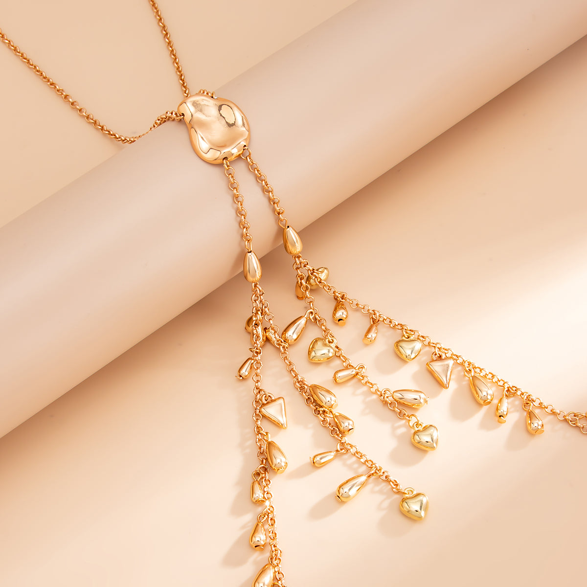 Goldtone Geometric Tassel Statement Necklace, vintage-inspired design, side view
