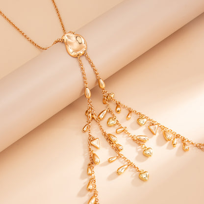 Goldtone Geometric Tassel Statement Necklace, vintage-inspired design, side view