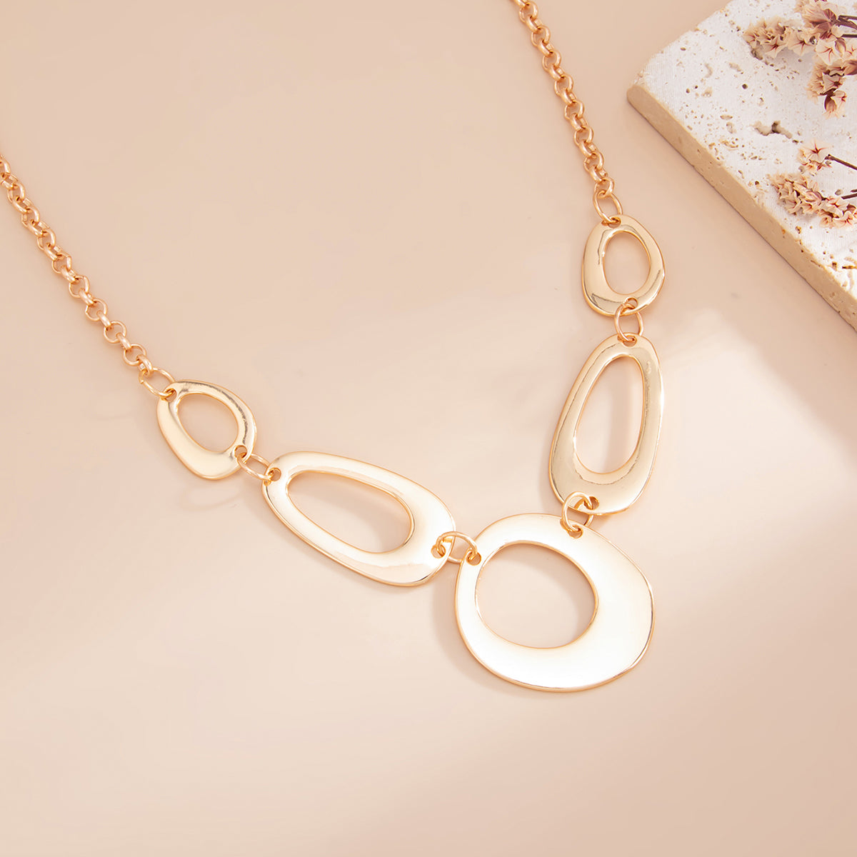 Goldtone Open Geometric Necklace, dainty minimalist design, detail close-up