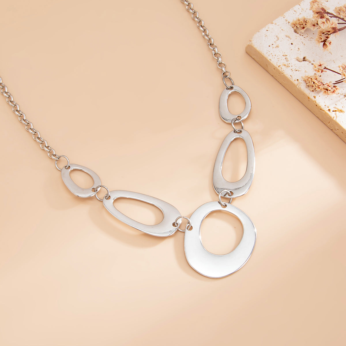Silvertone Open Geometric Necklace, botanical inspired, detail close-up