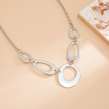 Silvertone Open Geometric Necklace, botanical inspired, detail close-up