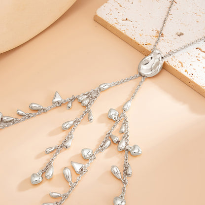 Silvertone Geometric Tassel Statement Necklace, dainty minimalist design, detail close-up