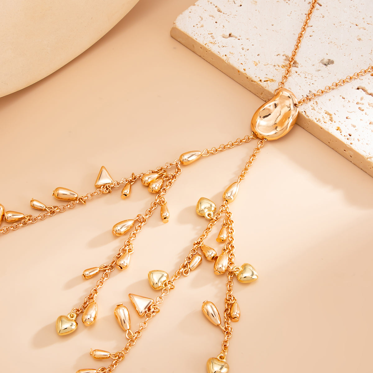 Goldtone Geometric Tassel Statement Necklace, vintage-inspired design, detail close-up
