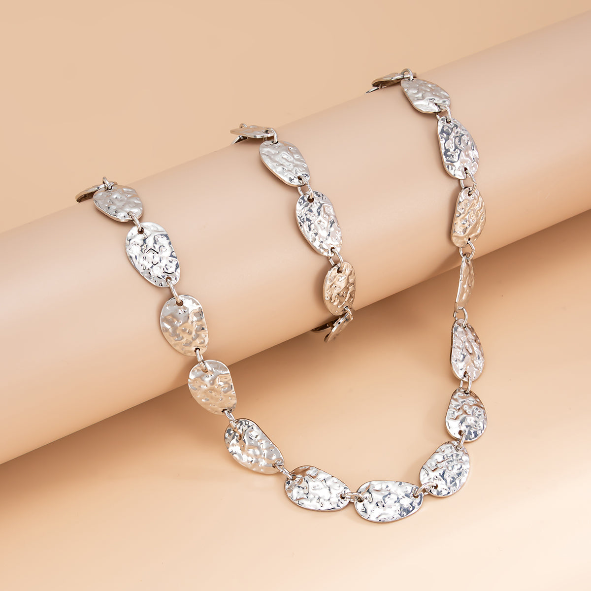 Silvertone Hammered Pear Chain Bracelet and Necklace Set, dainty minimalist design, side view