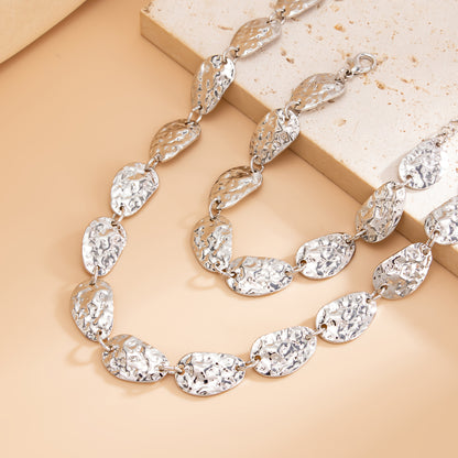 Silvertone Hammered Pear Chain Bracelet and Necklace Set, dainty minimalist design, detail close-up