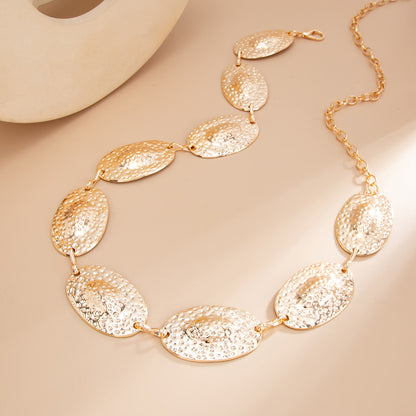 Goldtone Hammered Oval Station Waist Chain, dainty minimalist design, detail close-up