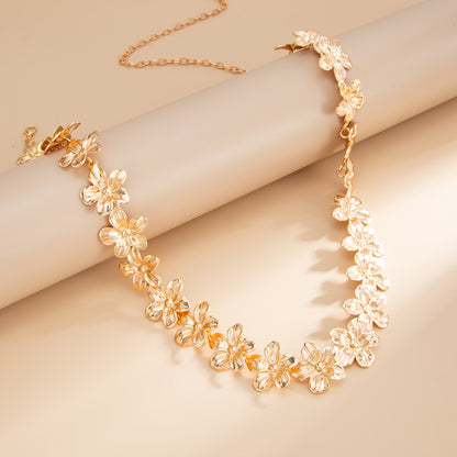 Goldtone Flower Link Waist Chain, dainty minimalist design, side view
