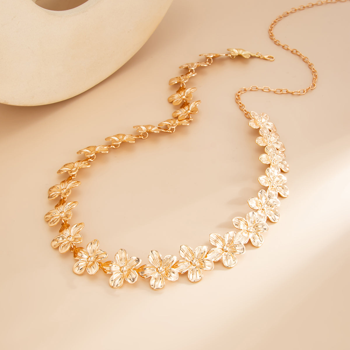 Goldtone Flower Link Waist Chain, dainty minimalist design, detail close-up