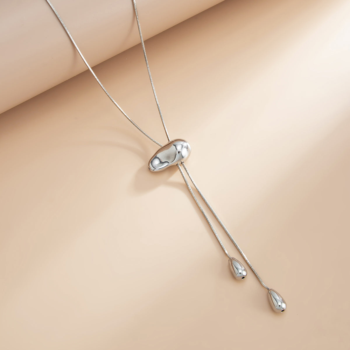 Silvertone Drop Tassel Lariat Necklace, dainty minimalist design, detail close-up