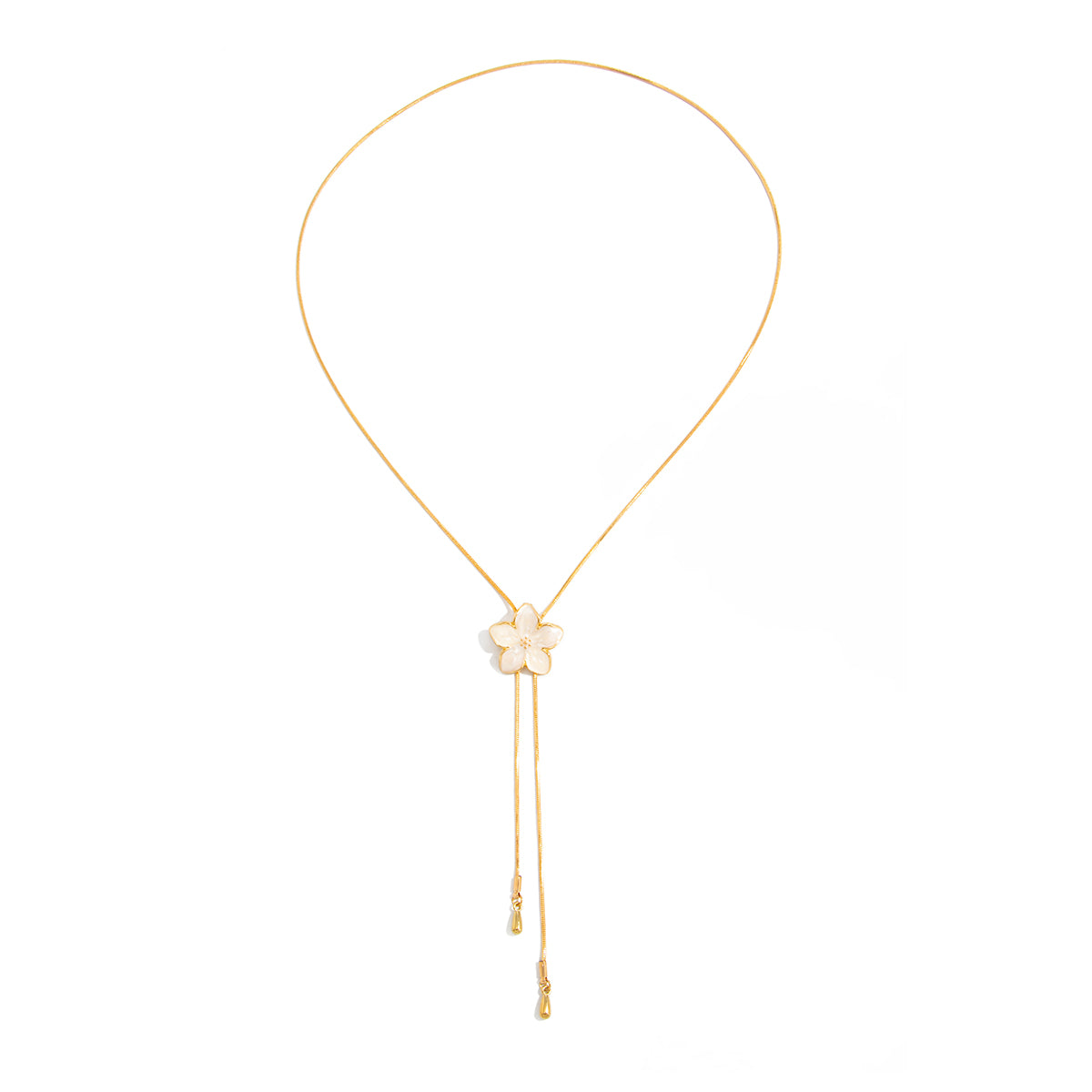 White Enamel and Goldtone Flower Tassel Pendant Necklace, botanical inspired, front view
