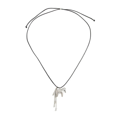 Black Polyster and Silvertone Horse Tassel Pendant Necklace, dainty minimalist design, front view