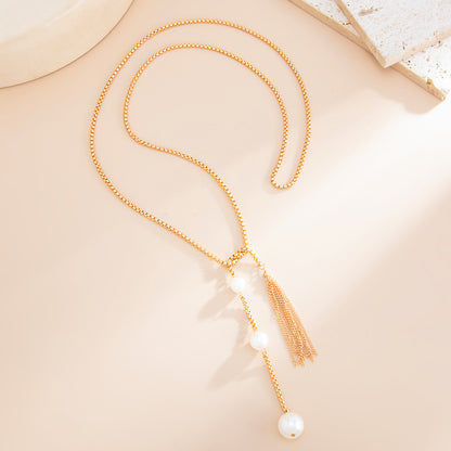 Pearl and Goldtone Tassel Knot Necklace, botanical inspired, detail close-up