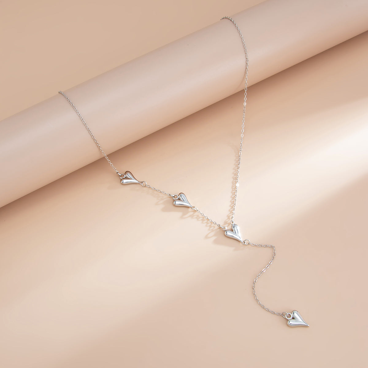 Silvertone Heart Drop Y-Necklace, everyday style, side view