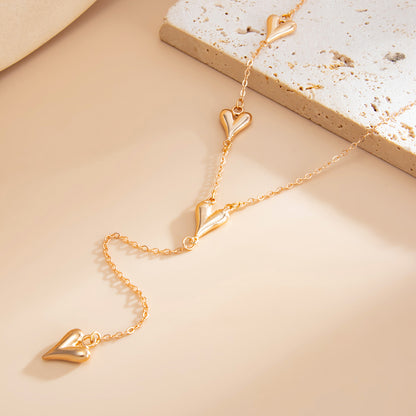 Goldtone Heart Drop Y-Necklace, elegant gift for her, detail close-up