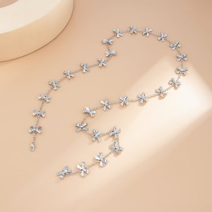 Silvertone Bow Station Lariat Necklace, botanical inspired, detail close-up
